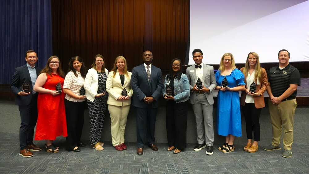 Superintendent Award Winners pose for a photo.