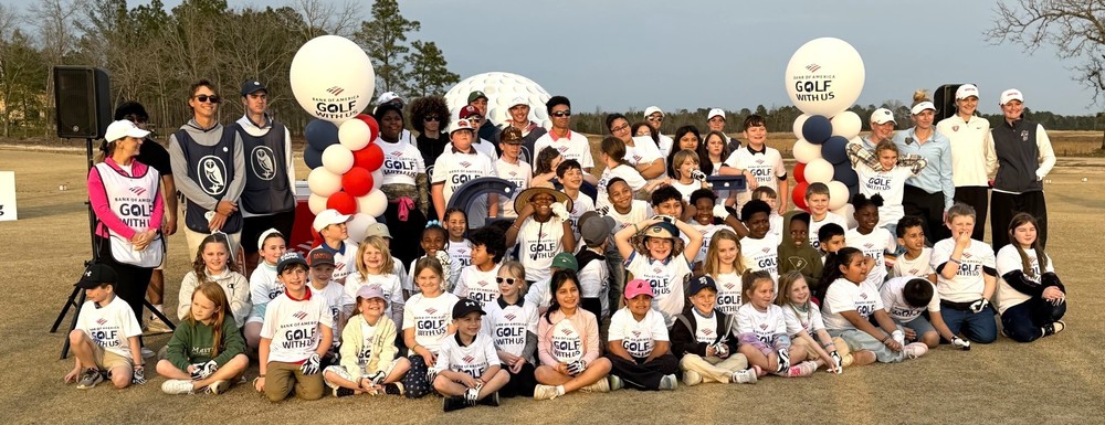 All of the students and instructors who participated in the More Than Golf Invitational posing for a group photo.