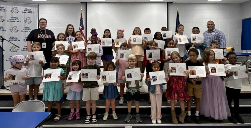 Habit 1 Students holding certificates