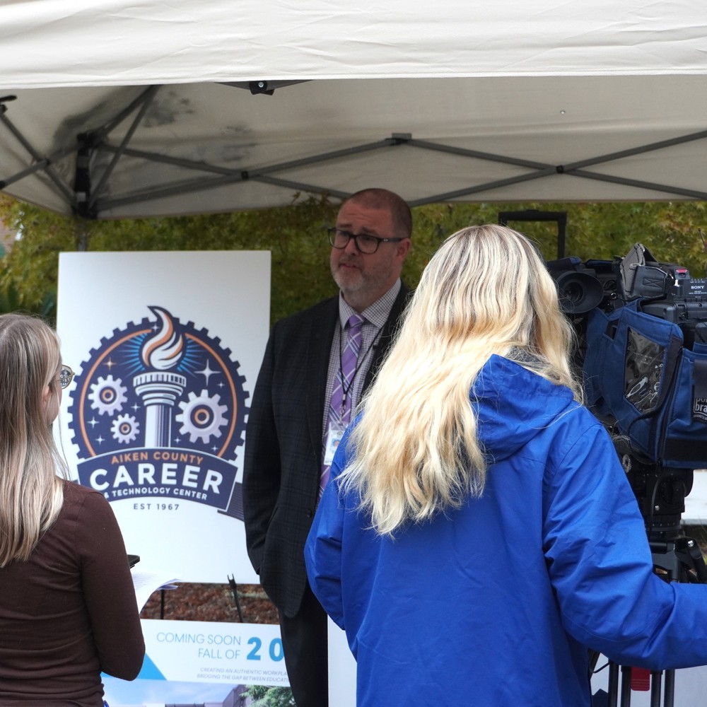 Principal David Harris speaking to media during ACCTCs new Logo unveiling.