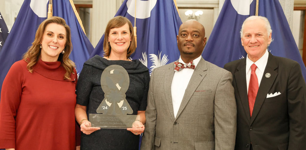 Principal Messick and Superintendent Dr. Corey Murphy receiving award for Blue Ribbon School.