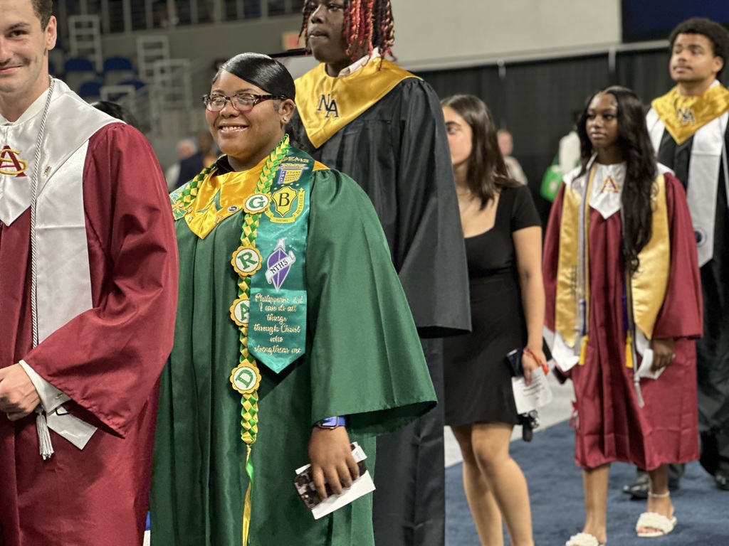 A male South Aiken, Female Aiken High, and Male North Augusta High student smile.