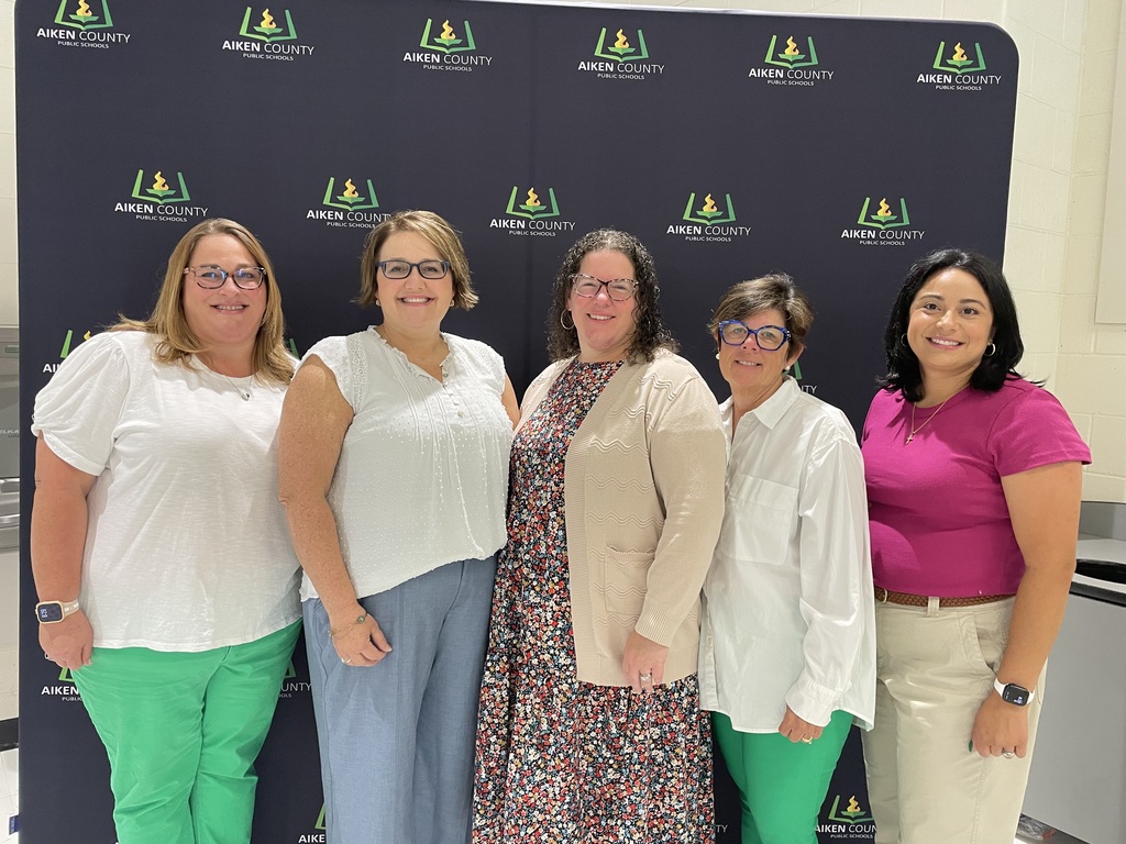 five women smiling