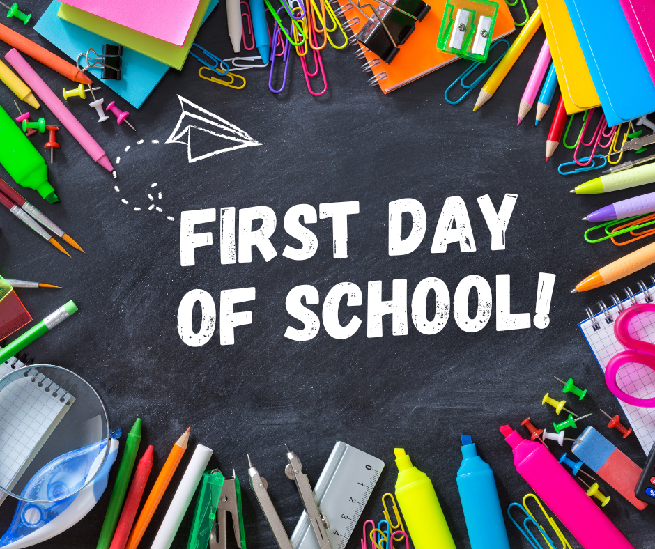 School supplies surrounding chalk board writing of first day of school