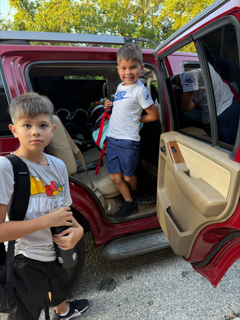 students arriving for school