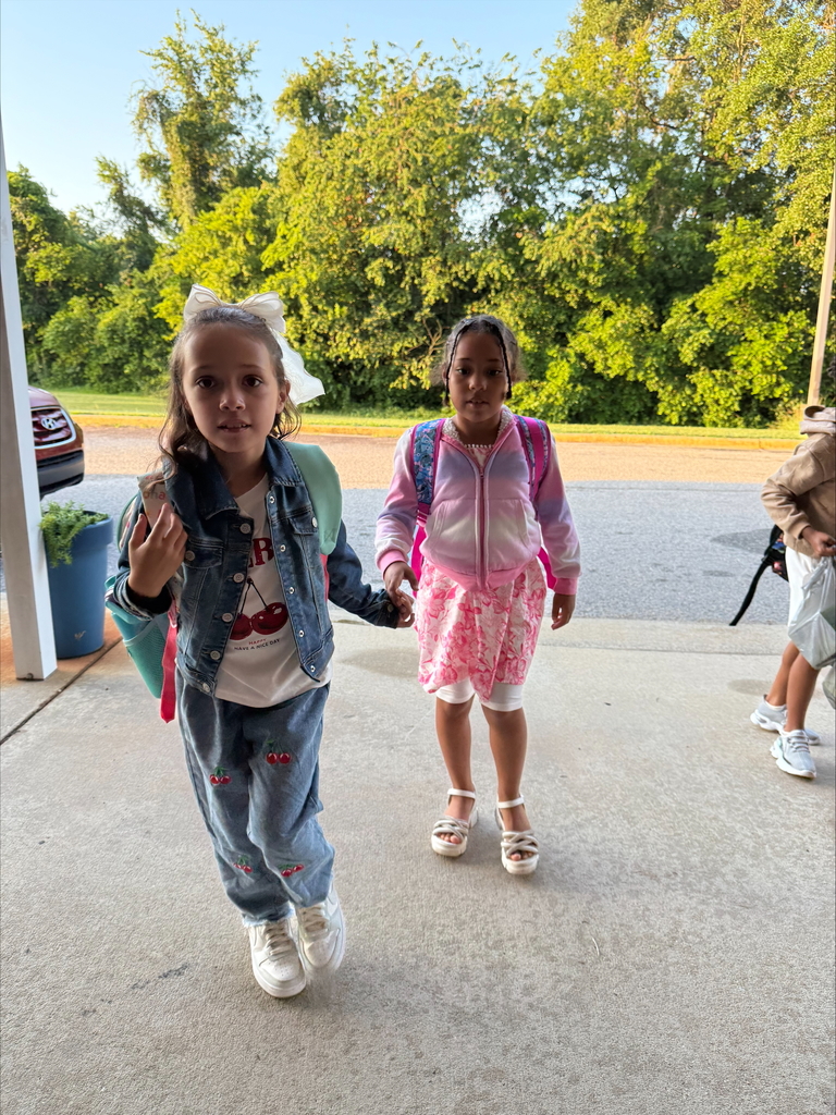 students arriving for school