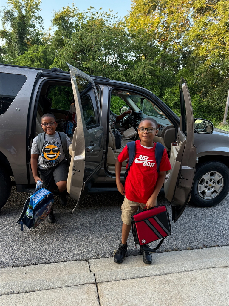 students arriving for school
