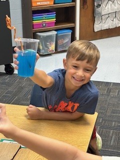 second grade students with "jitter Juice'