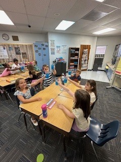 second grade students with "jitter Juice'