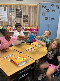 second grade students with "jitter Juice'