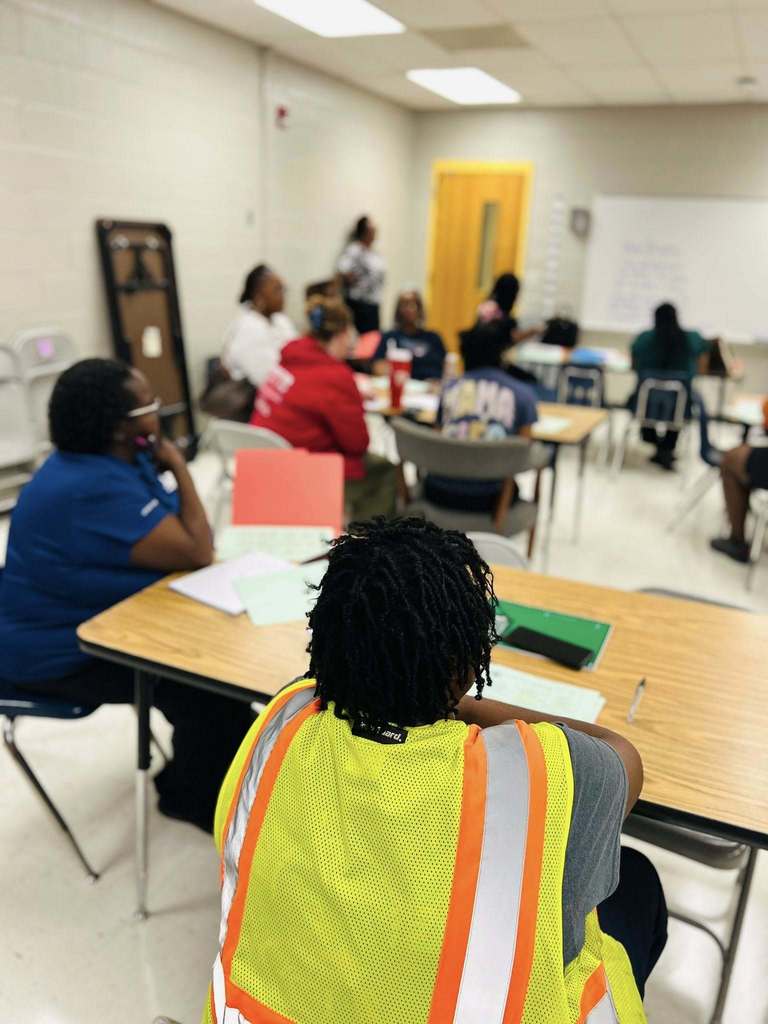 Pictures of North Aiken Elementary school's first PTO meeting. Parents and teachers collaborate . 