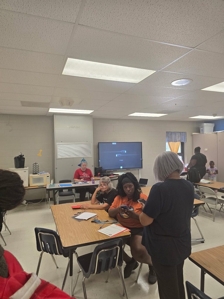 Pictures of North Aiken Elementary school's first PTO meeting. Parents and teachers collaborate . 