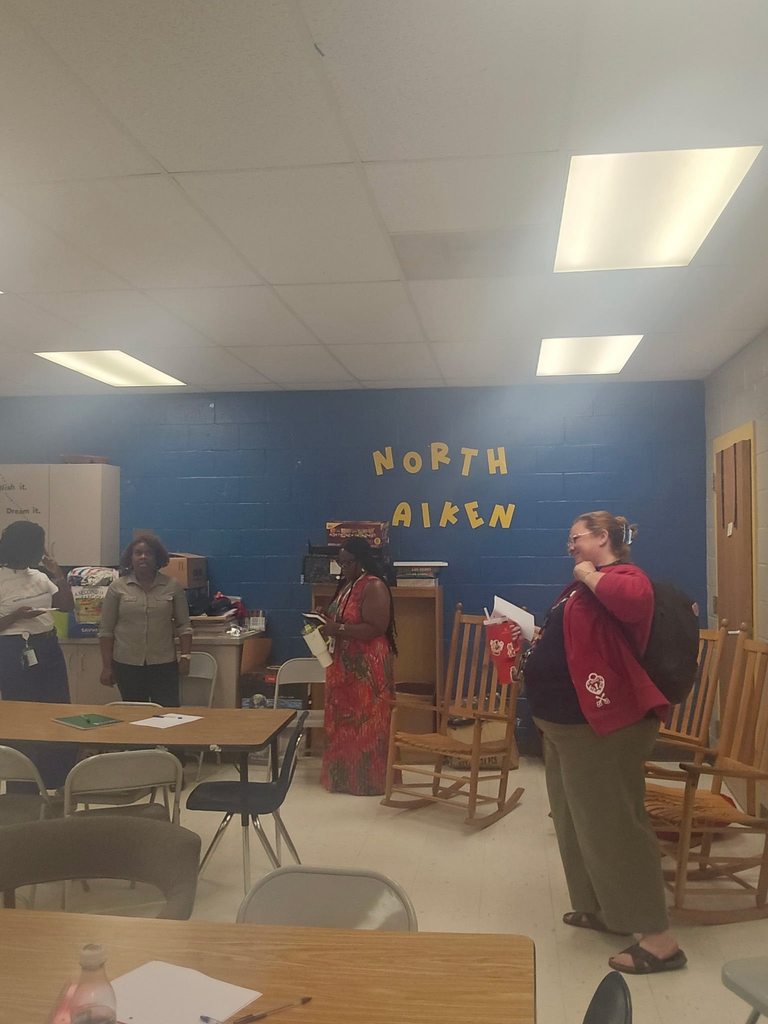 Pictures of North Aiken Elementary school's first PTO meeting. Parents and teachers collaborate . 