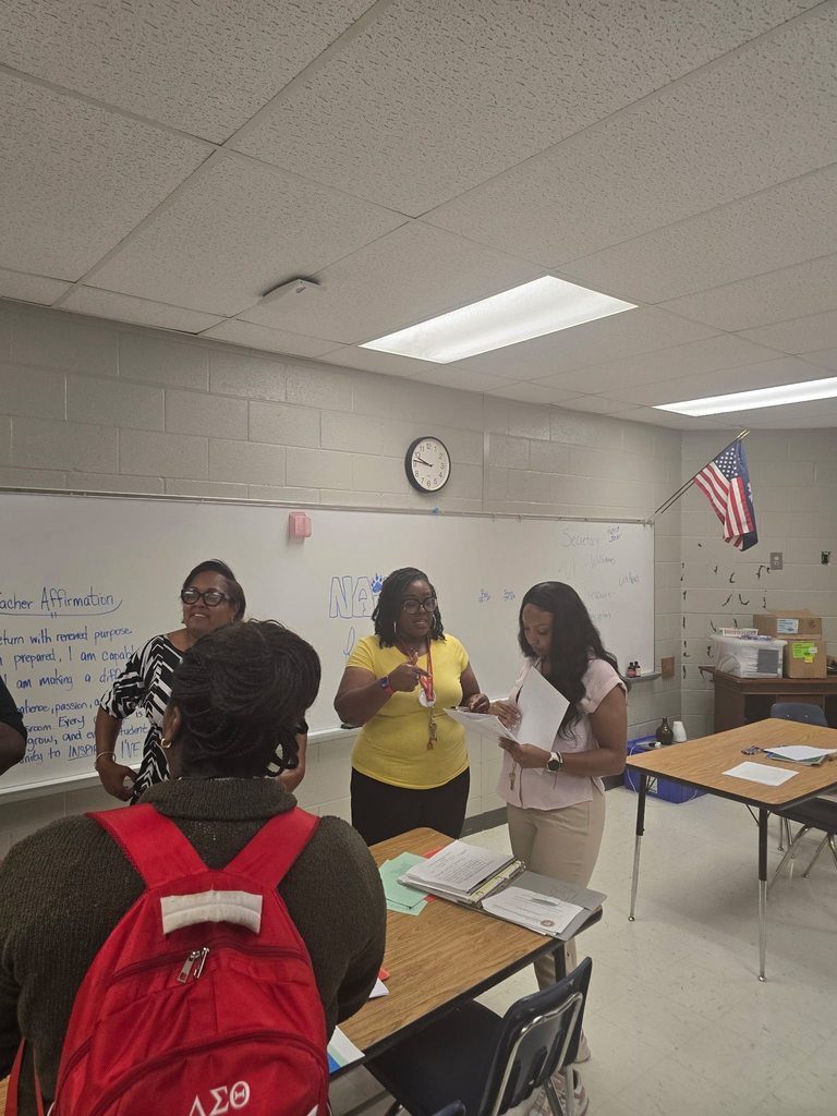 Pictures of North Aiken Elementary school's first PTO meeting. Parents and teachers collaborate . 
