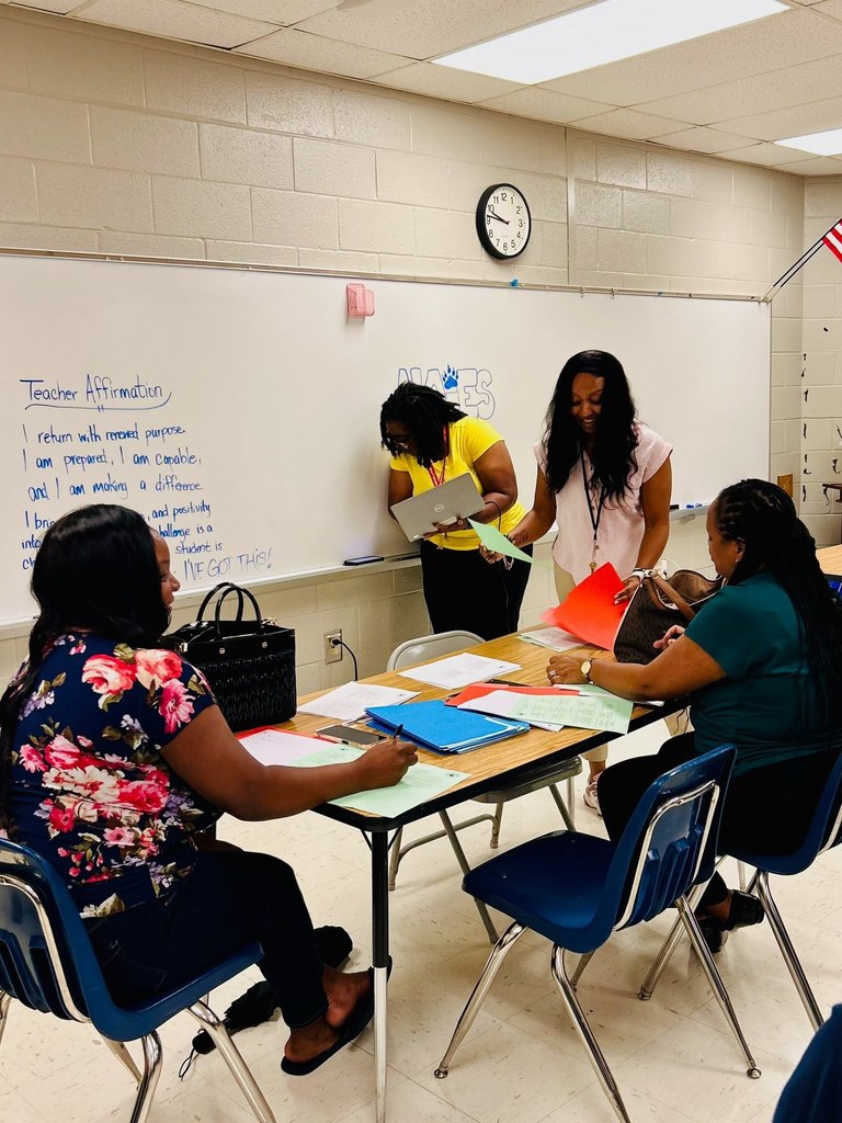 Pictures of North Aiken Elementary school's first PTO meeting. Parents and teachers collaborate . 
