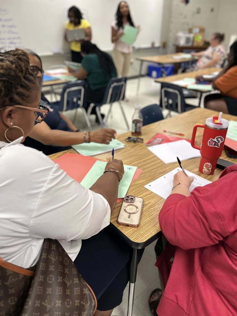 Pictures of North Aiken Elementary school's first PTO meeting. Parents and teachers collaborate . 