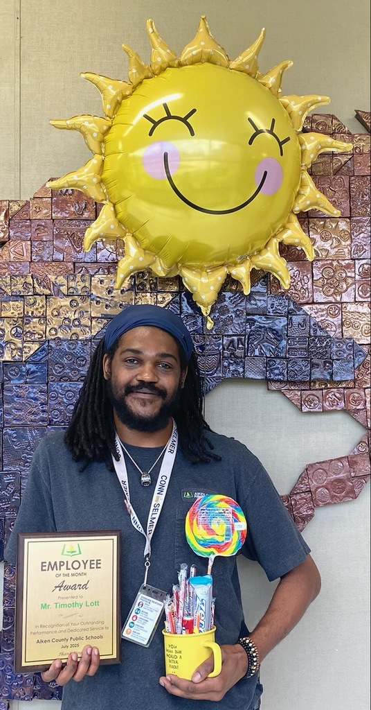 Man smiling with sunhine.