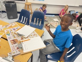 Student working on rounding to the nearest dollar
