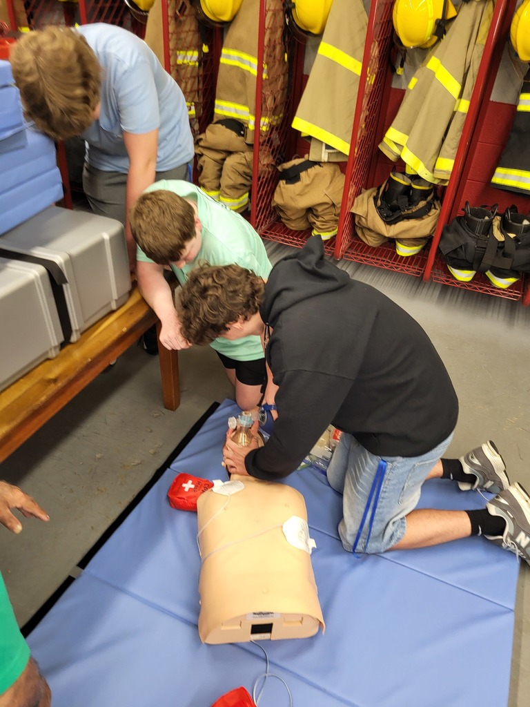 Students practice proper CPR mask sealing