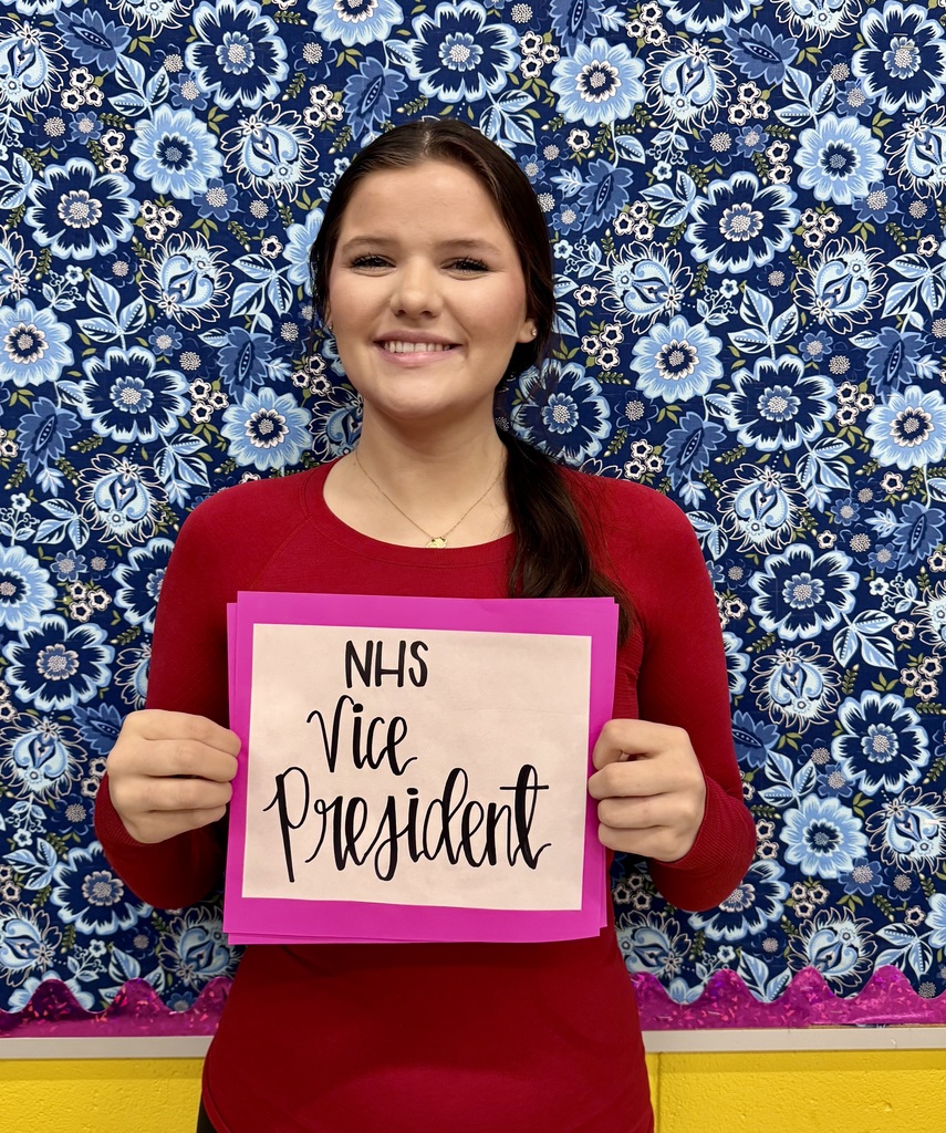 Girl portrait holding NHS Vice President Sign. 