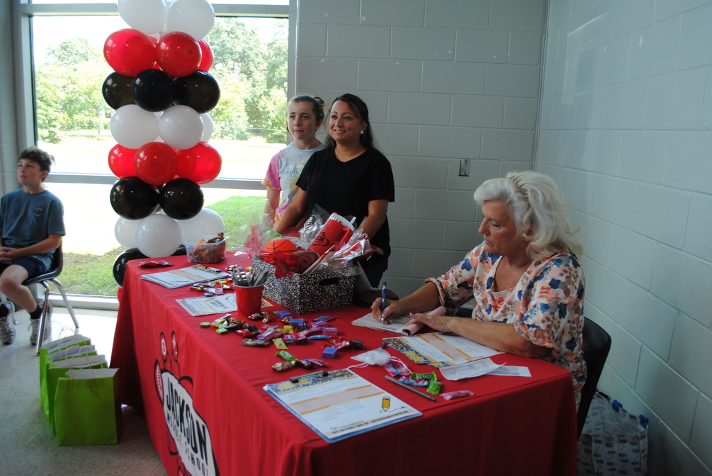 PTO members at sign up table.
