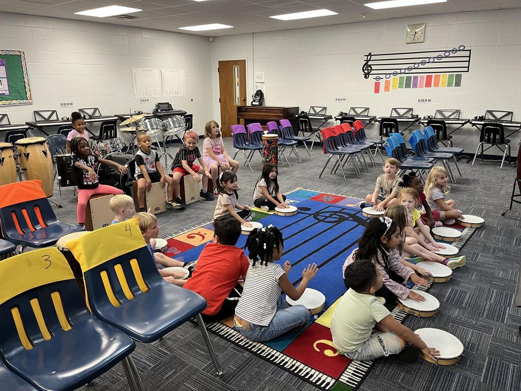 Kindergarten Music Class keeping a beat!