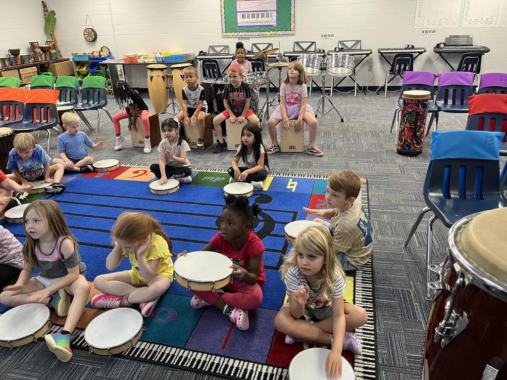 Kindergarten Music Class keeping a beat!