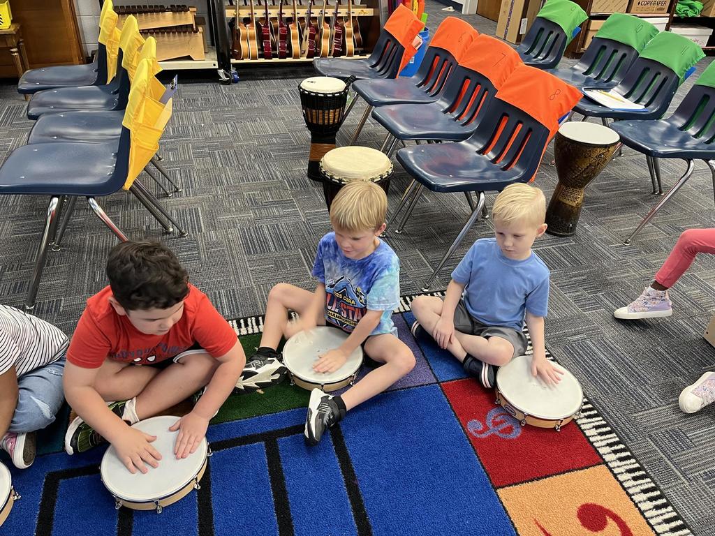 Kindergarten Music Class keeping a beat!
