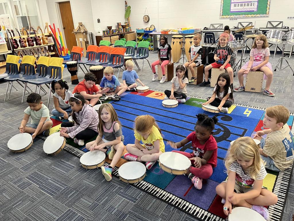 Kindergarten Music Class keeping a beat!