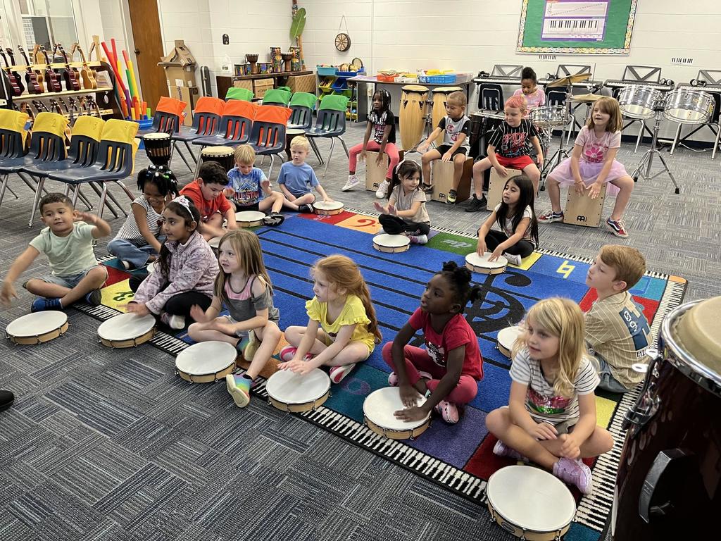 Kindergarten Music Class keeping a beat!