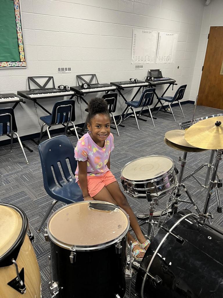 Kindergarten Music Class keeping a beat!