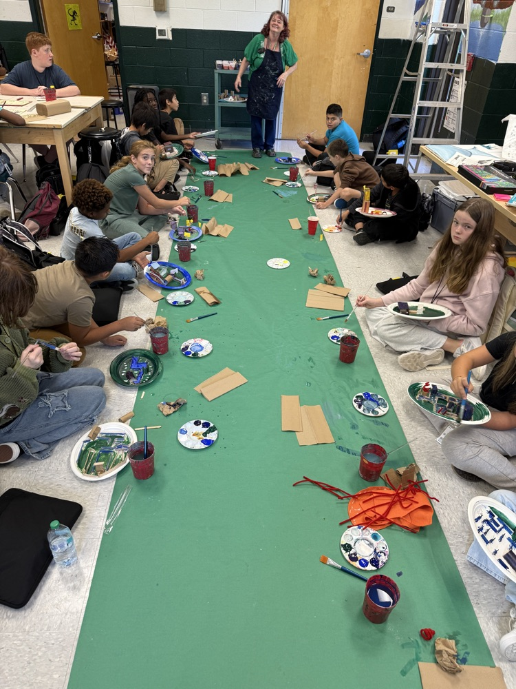 students painting