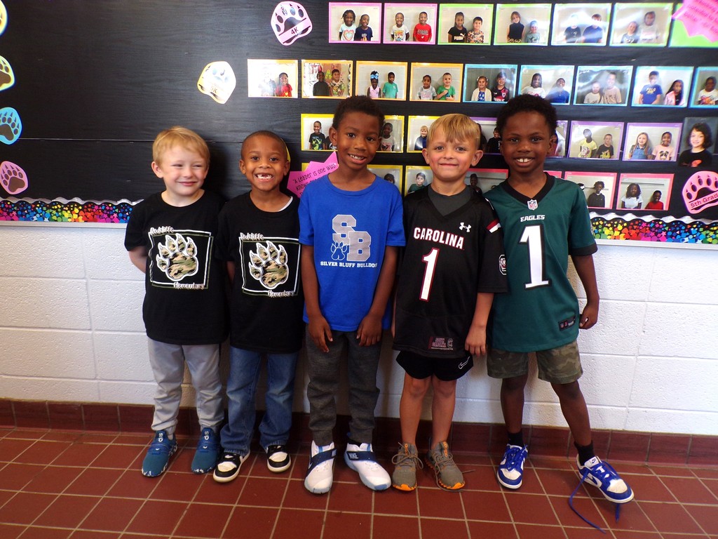 Students in team attire.