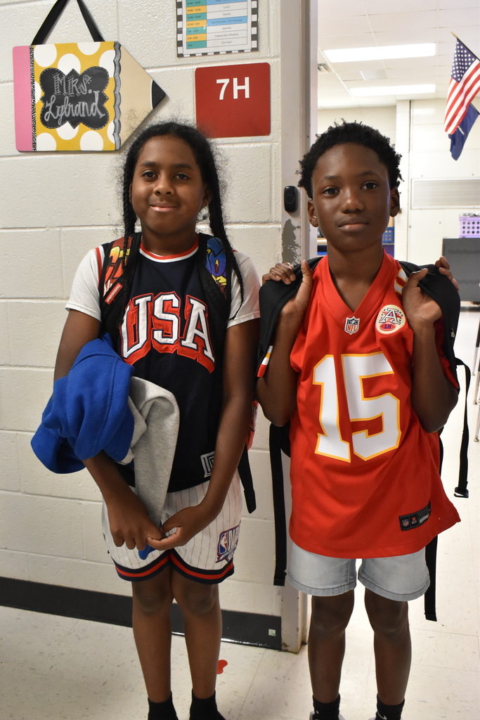 Students in team attire.