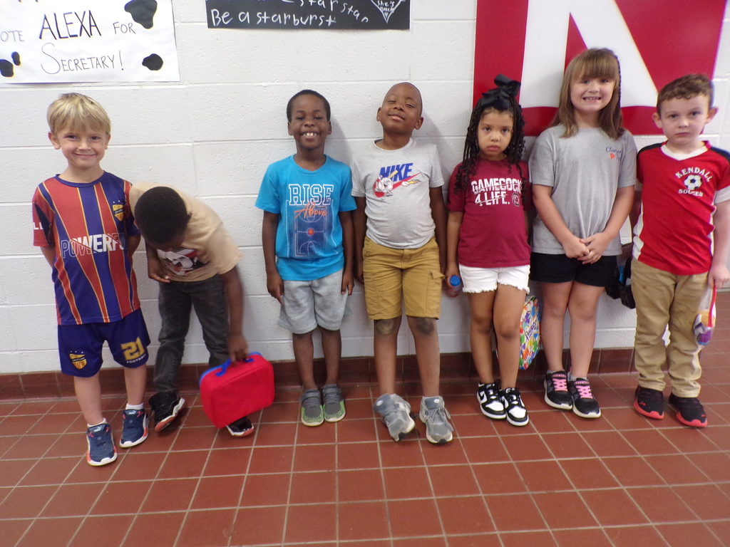Students in team attire.
