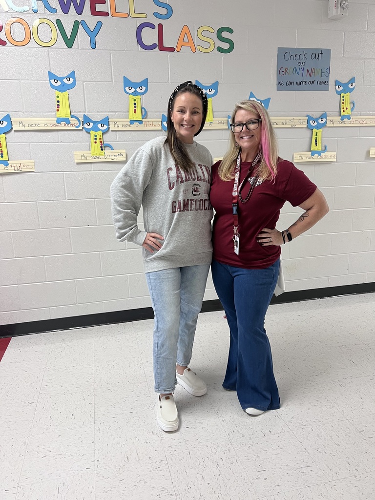 Teachers in team attire.