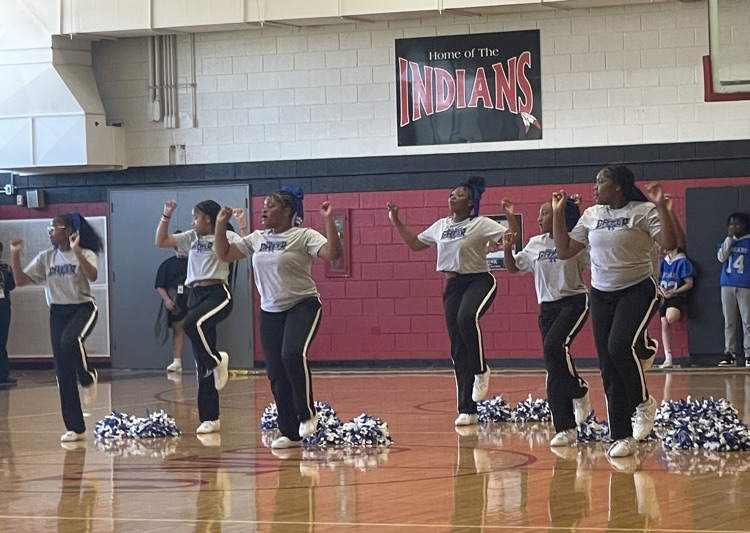 Cheer team performing.