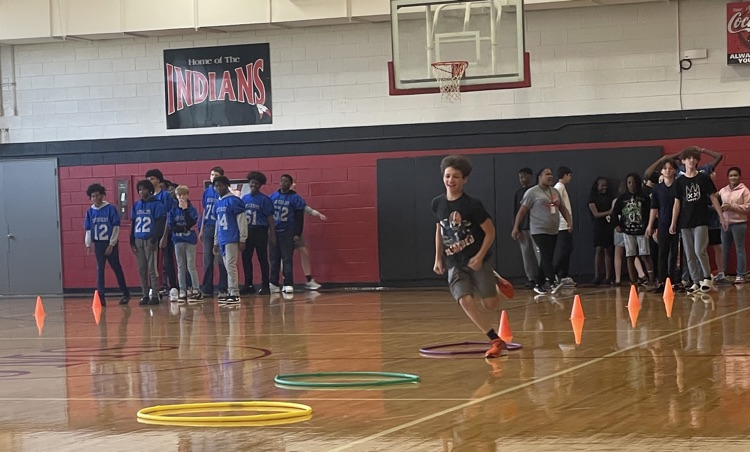 Pep rally relay competition.