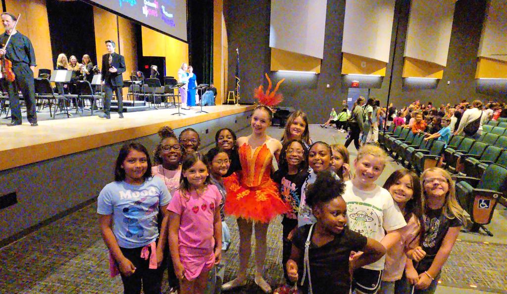 Aiken Civic Orchestra Performer with students