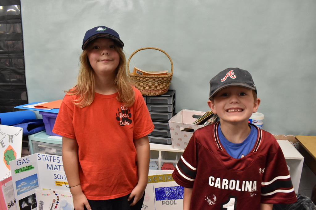 Students wearing hats at school.