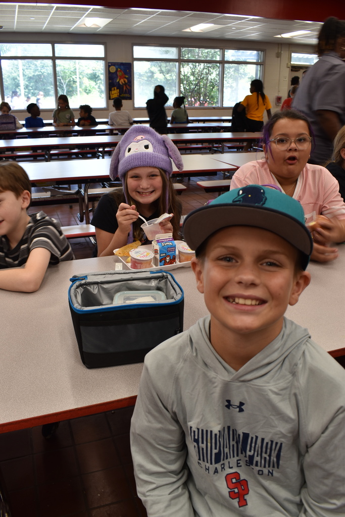 Students wearing hats at school.