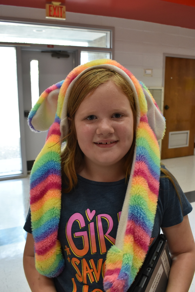 Students wearing hats at school.