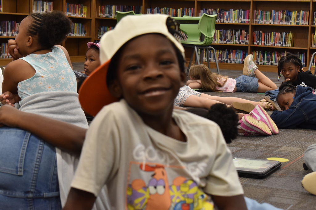 Students wearing hats at school.