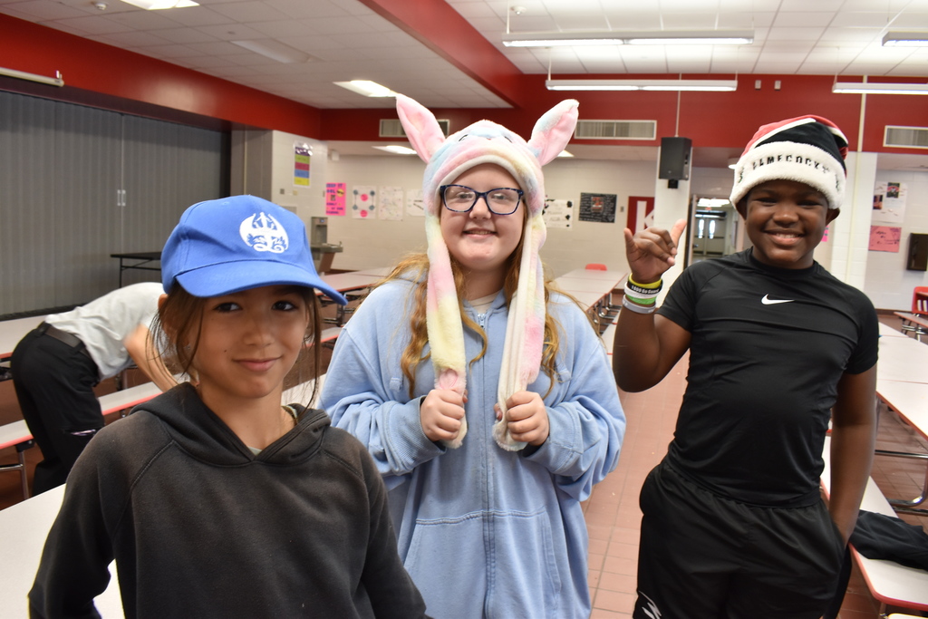 Students wearing hats at school.