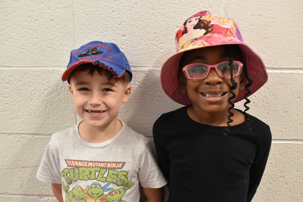 Students wearing hats at school.