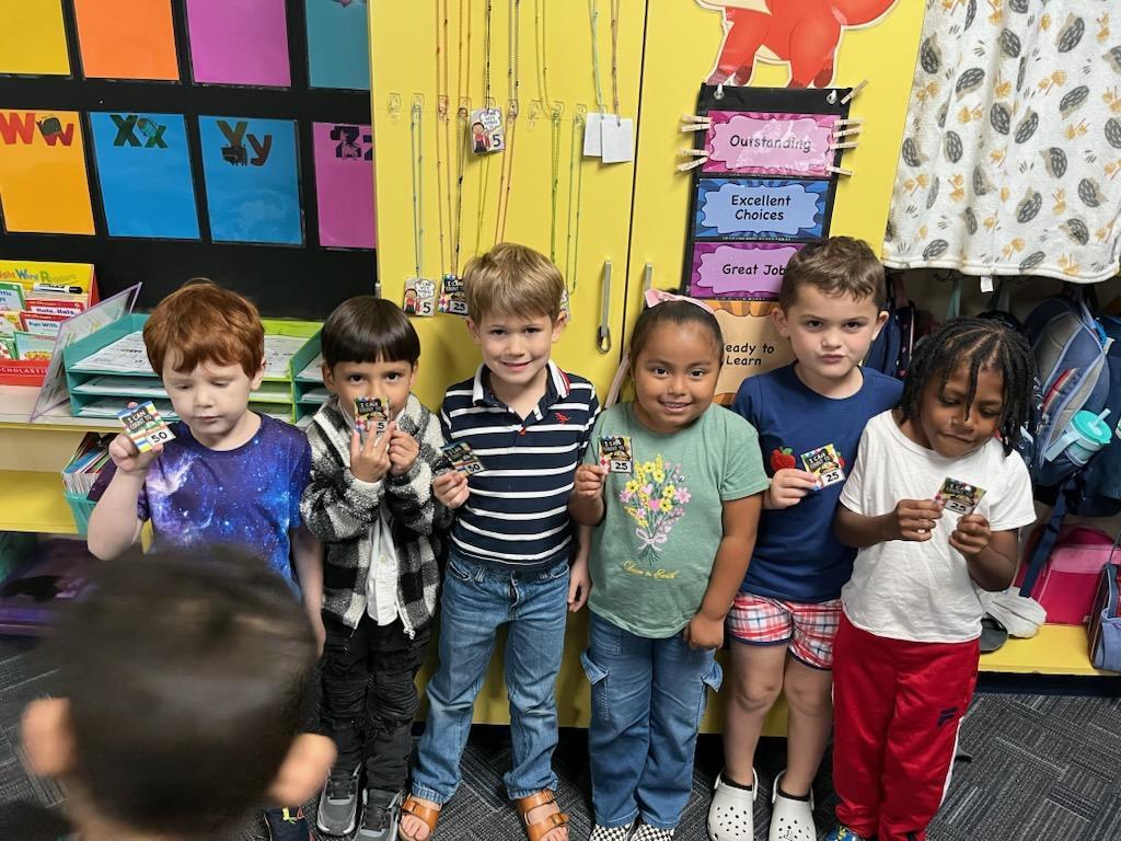 K Students showing off their Math Brag Tags 