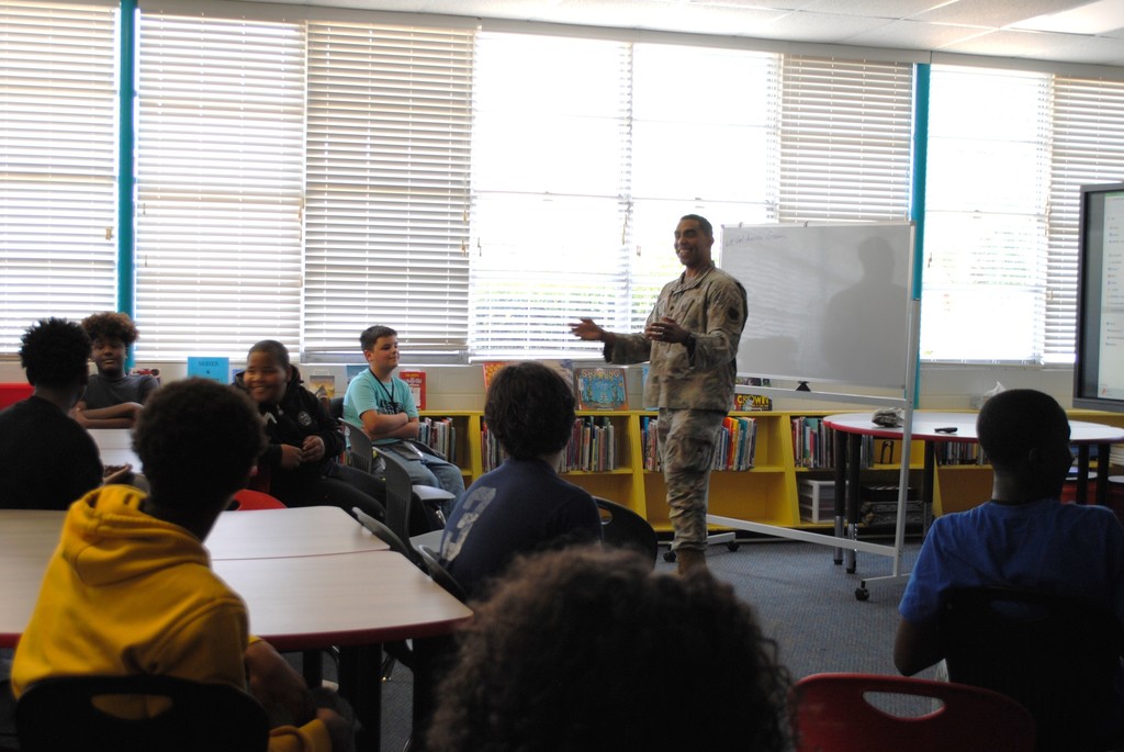 Lt. Col. Aaron Green speaking to students.