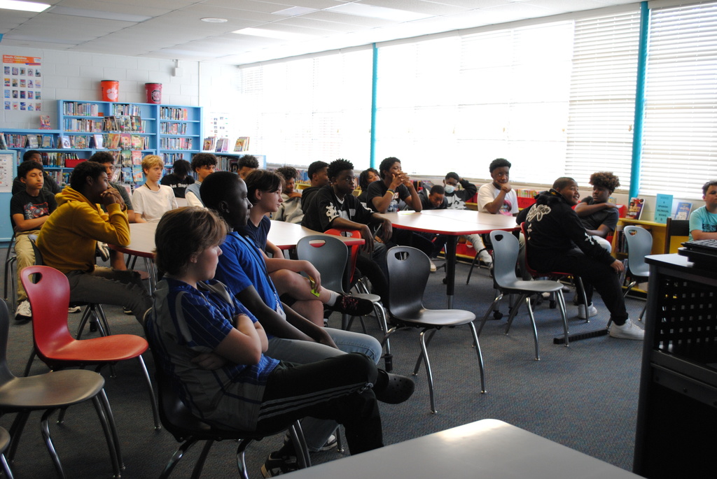 Students listening to a guest speaker.