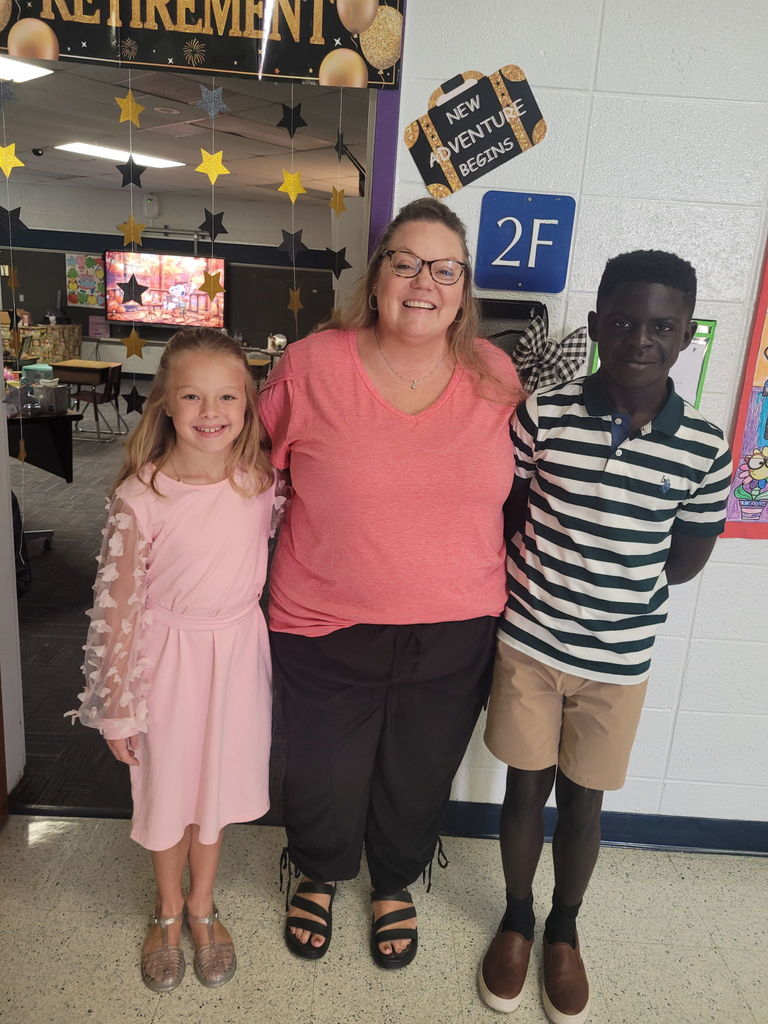 Teacher with two former students