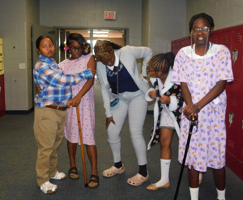 Students dressed up as grandparents and parents.